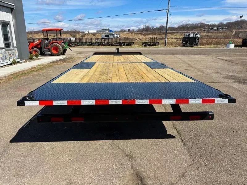 Deckover equipment trailer rental, rear view of the full-width wood deck
