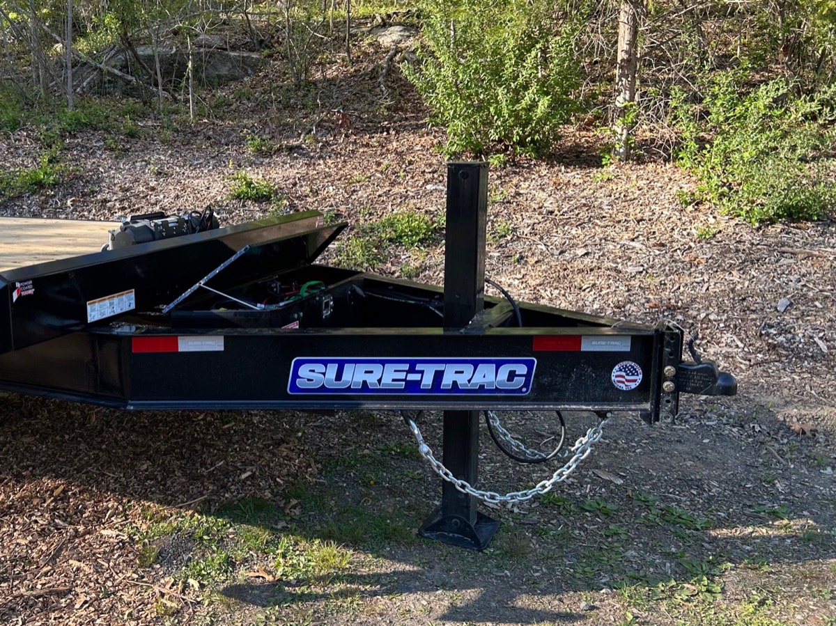 Sure-Trac deckover equipment trailer rental, tongue and front toolbox